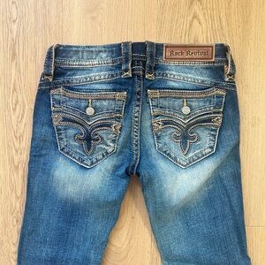 Rock Revival Women's Distressed Blue Bootcut Jeans with Embroidered Pockets